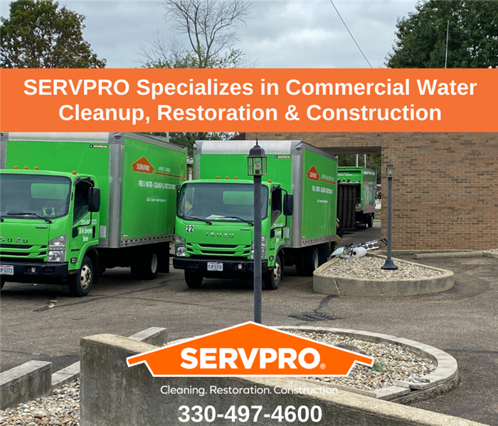 SERVPRO trucks in front of building